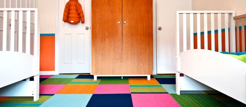 kids bedroom with colorful floor tiles