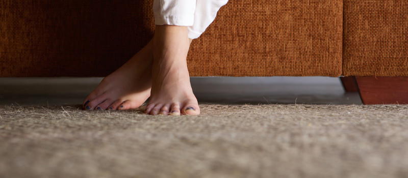 bare feet on rug