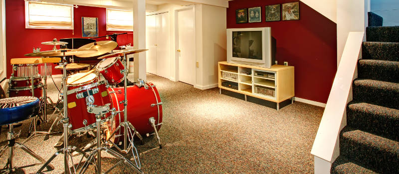 drumkit in a renovated basement