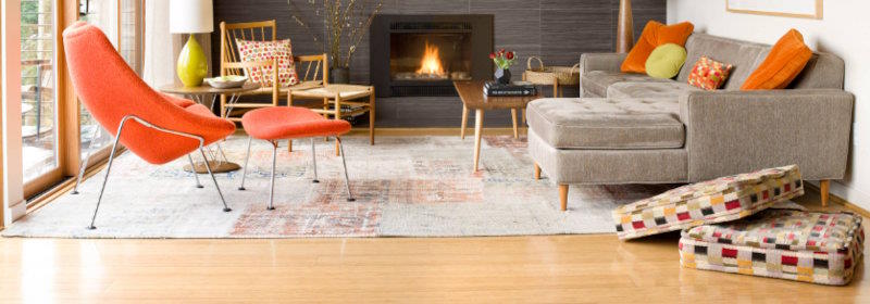 Glossy, light natural hardwood living room flooring